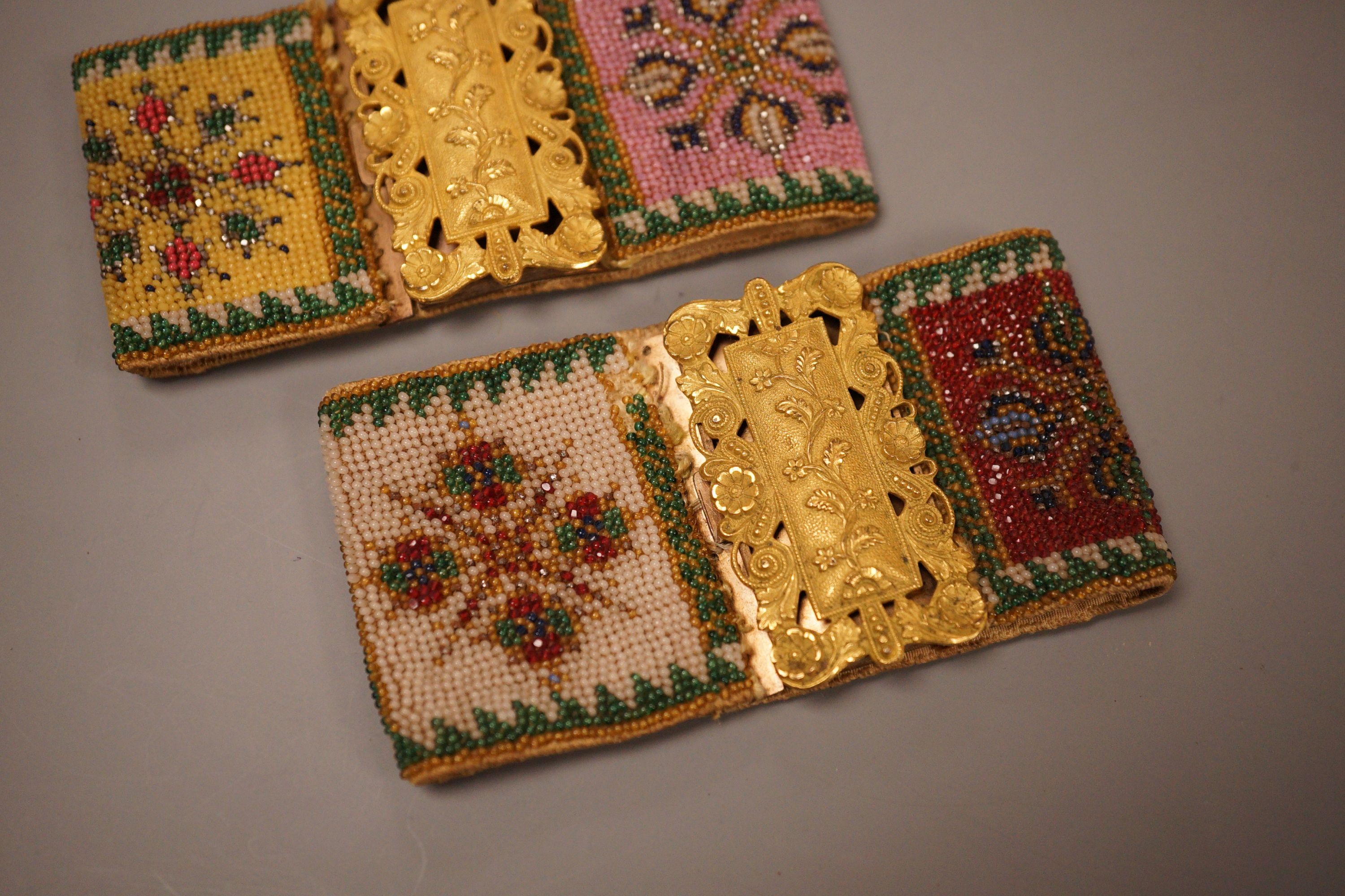 A pair of late Regency fine beadwork and ormolu bracelets